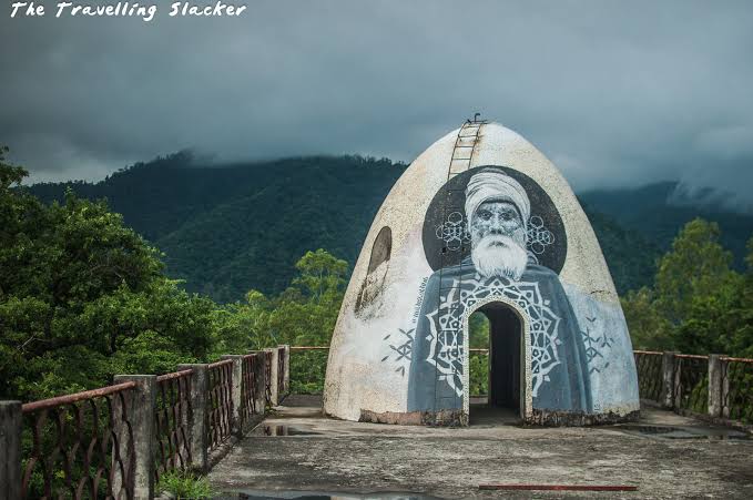A painted meditation dome at the Beatles Ashram, overlooking the forested hills